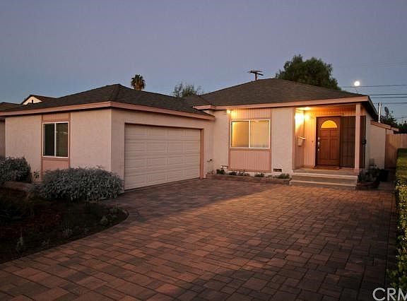 View of house at dusk.