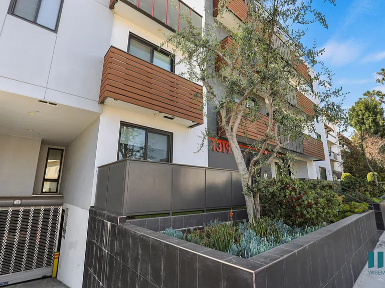 Sidewalk View of Martel Flats