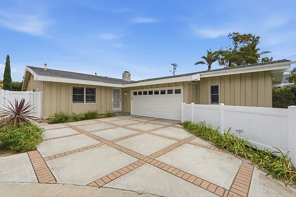 Front of house. 4 bedrooms, 2 full bathrooms.