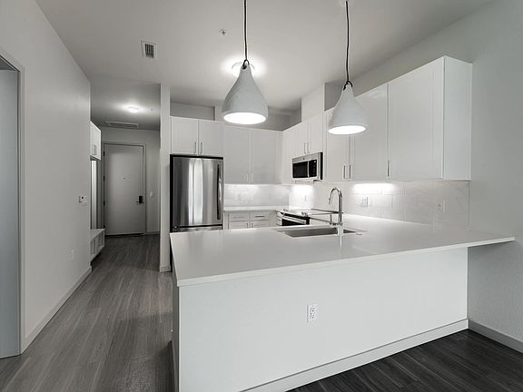Sleek kitchens featuring Under-cabinet lighting