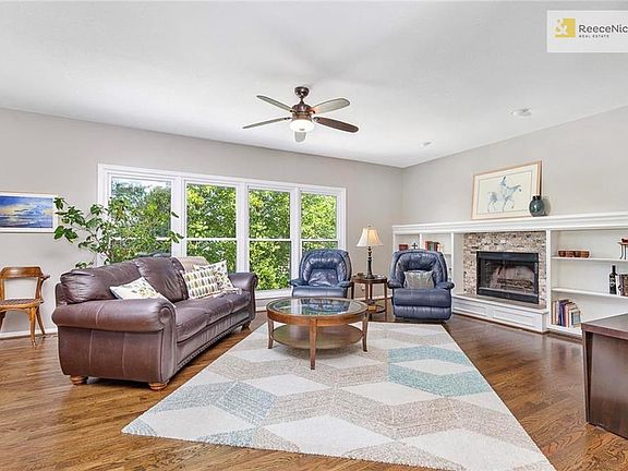 Natural light and tree-top views fill this home!