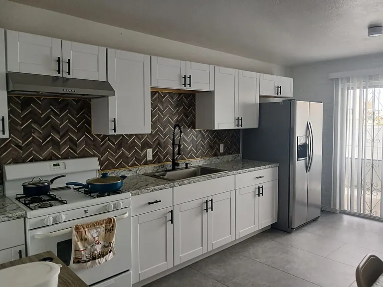 Experience the charm of a beautifully remodeled kitchen designed for both style and functionality.