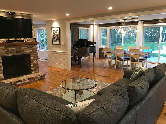 Living room, fireplace, dining