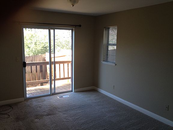 master bedroom has sliding door to backyard