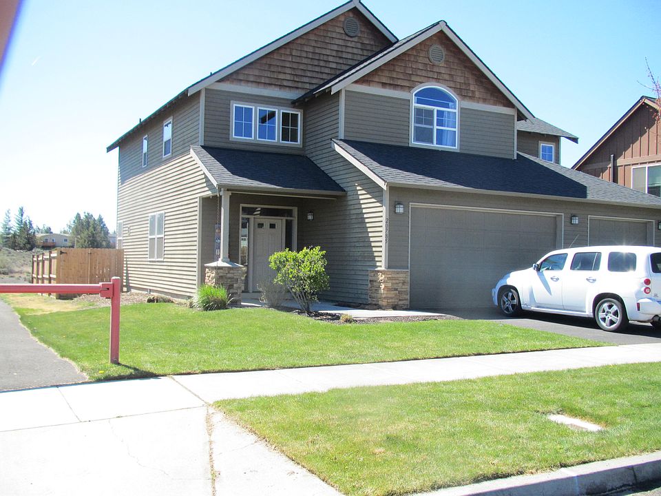 Front of House and 3 Car Gar