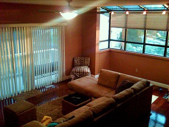Sunken Living Room w/ huge atrium looking out over water