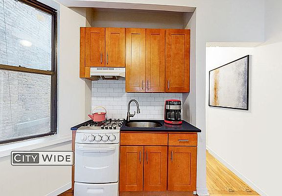 3rd image of 228 E 36th St APT 3b