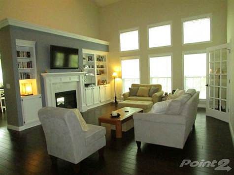 Hardwood flooring and gorgeous wood trim and built-ins throughout