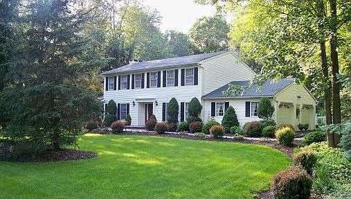 Tremendous curb appeal, beautifully landscaped yard.