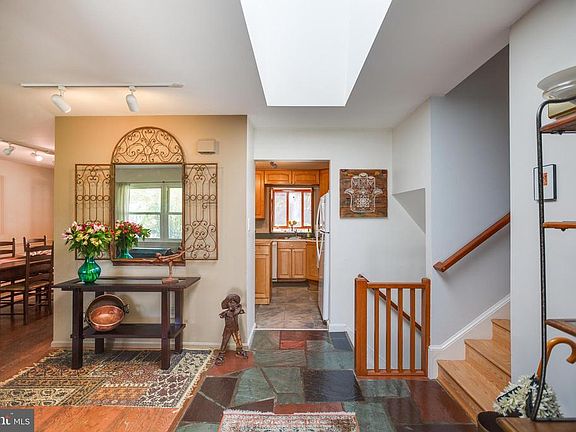Inviting entry foyer with skylight