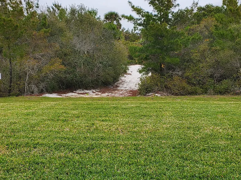 1949 NE Ocean Dunes Dr — Photo 30