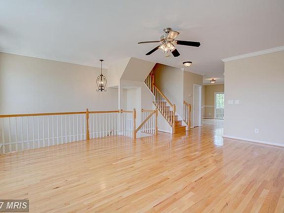 GLEAMING Hardwood Flooring Throughout!