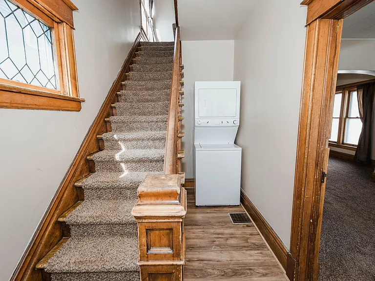 Entry way with w/d and stairs to 2nd floor bedrooms