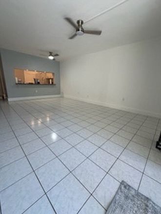 LIVING AREA LOOKING AT KITCHEN