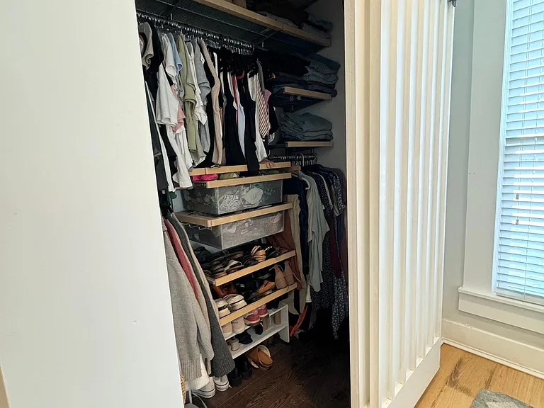 Master custom closet complete with sliding barn doors.