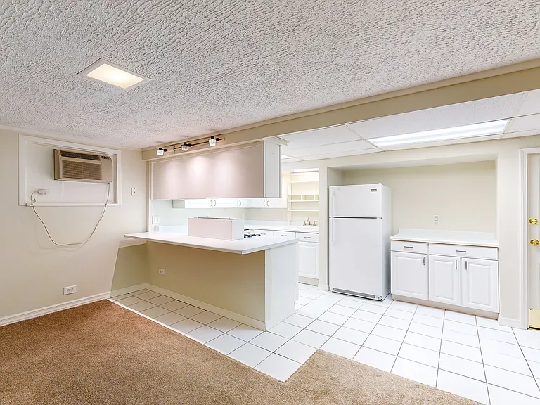 Nice, clean and bright kitchen space;
plenty of cabinets; dishwasher, refrigerator and oven.