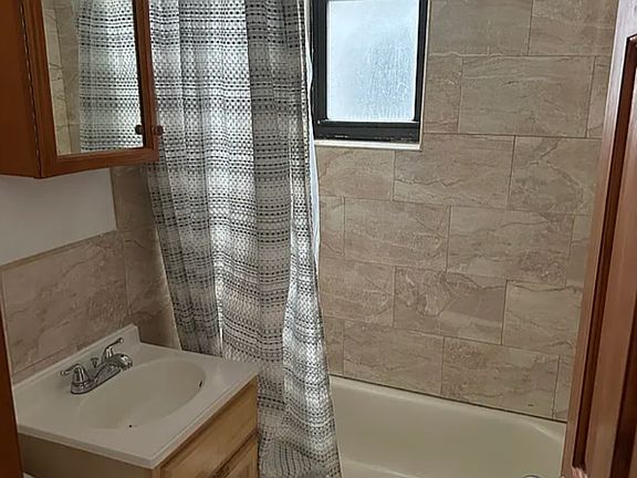 5th image of 6134 Madison St APT 4