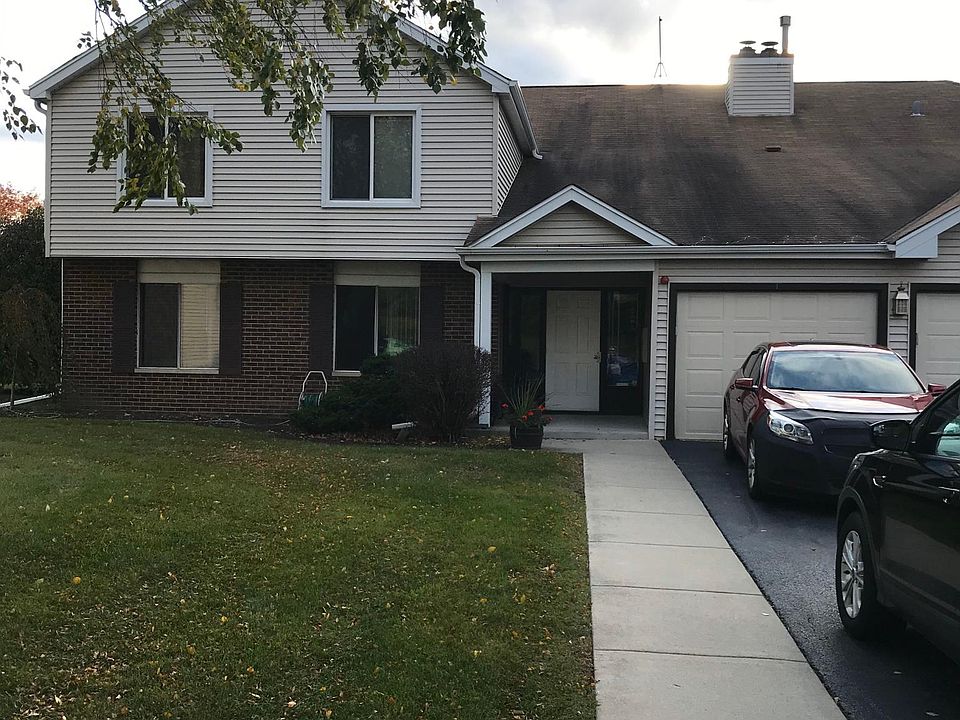Secured front entrance and 1 car garage/driveway