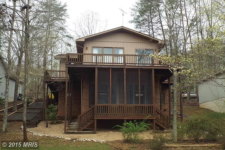 Dramatic Lakeside wrap deck from Backyard