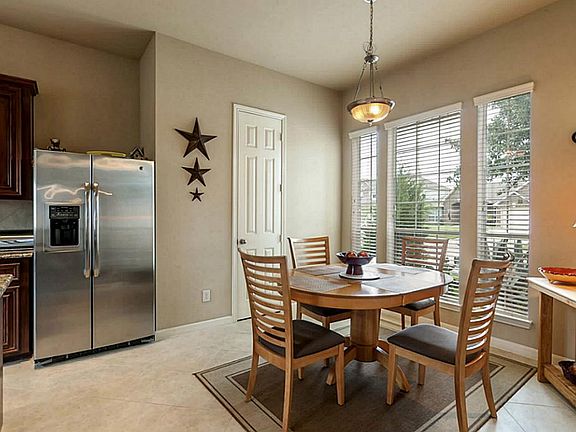 The breakfast area off the kitchen is another wonderful place to enjoy meals. This area also has a large window that allows great natural lighting.