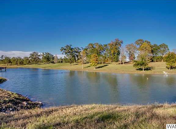 Private 6 +/- acre stocked lake!
