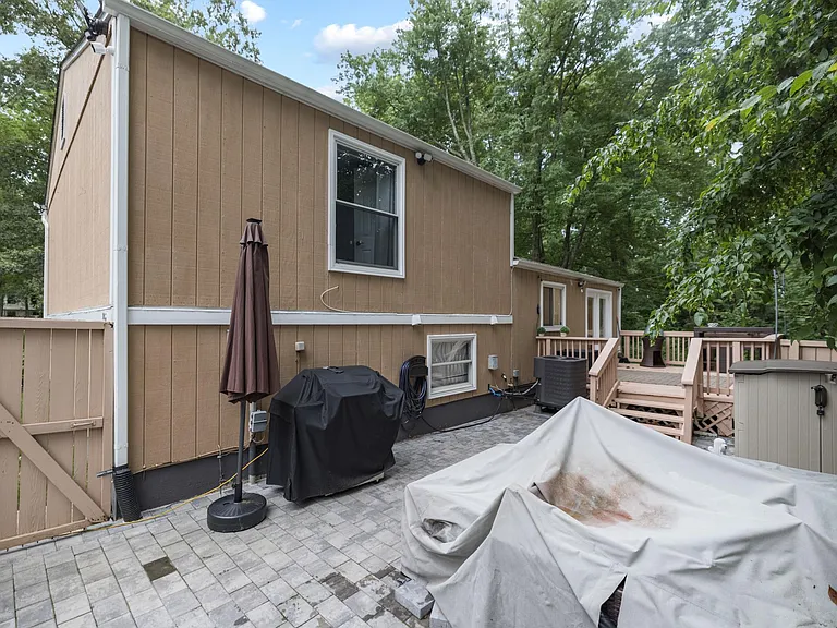 Long Pavers Patio with Access to Driveway