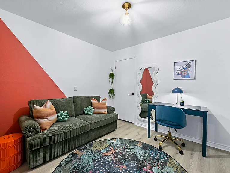 Bonus "flexroom" serves as a perfect guestroom or office space with pull out couch and custom wall treatments. Large spacious walk in closet include as well as 1/2 bath.