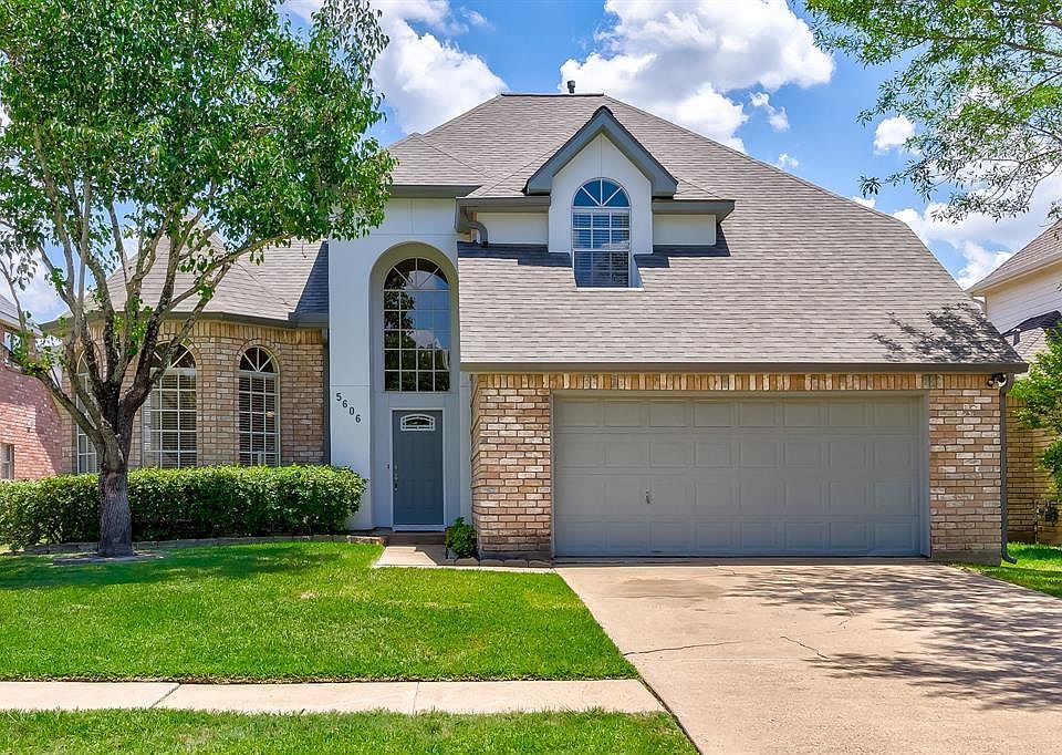 The arched windows and rotunda are just some of the architectural details that add to the charm of this quaint home.