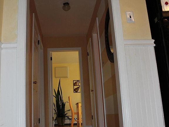 Hall way to the first floor bedrooms and bathroom