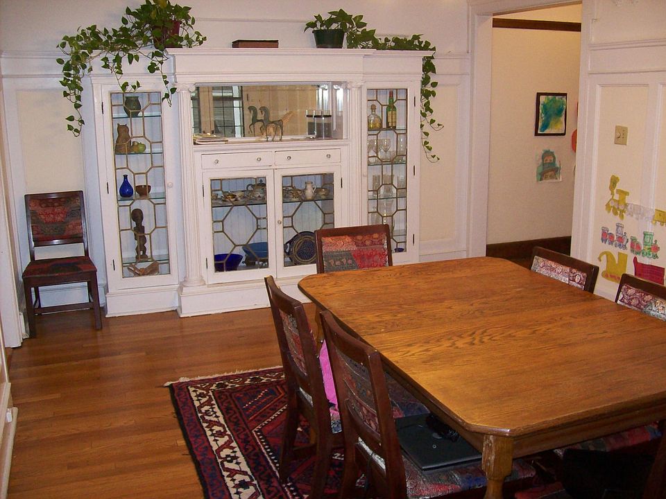 Spacious Separate Dining Room with Barrel Ceiling and Built-in Display Case