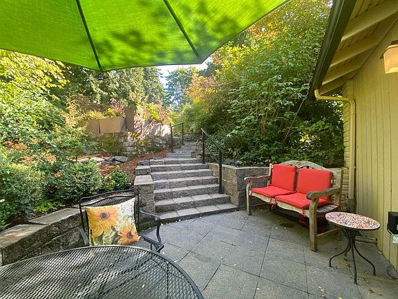 View from the patio table up to the parking area.