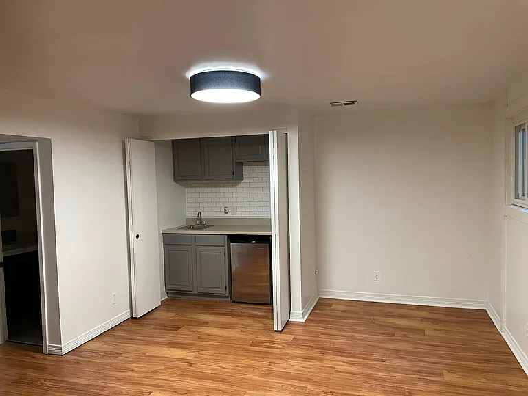 Basement bonus room with wet bar.