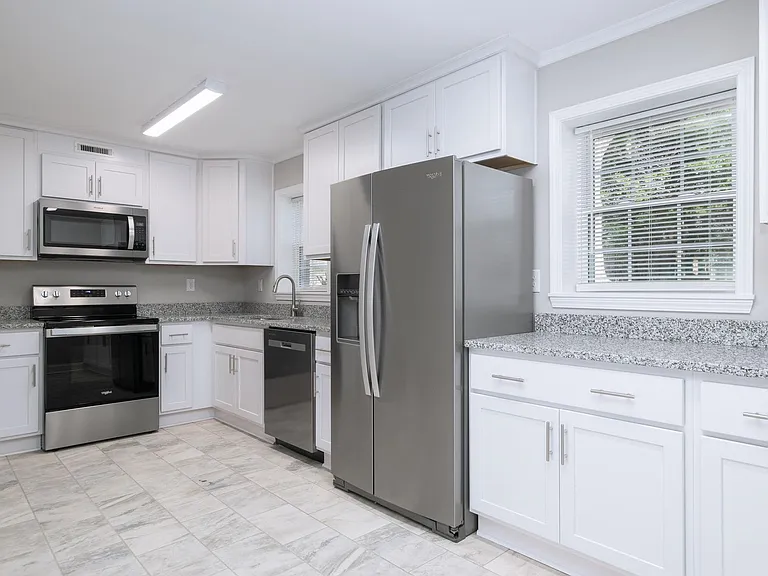 2 Bedroom/1 Bath and 3 Bedroom/2 Bath Quadplex — Photo 13