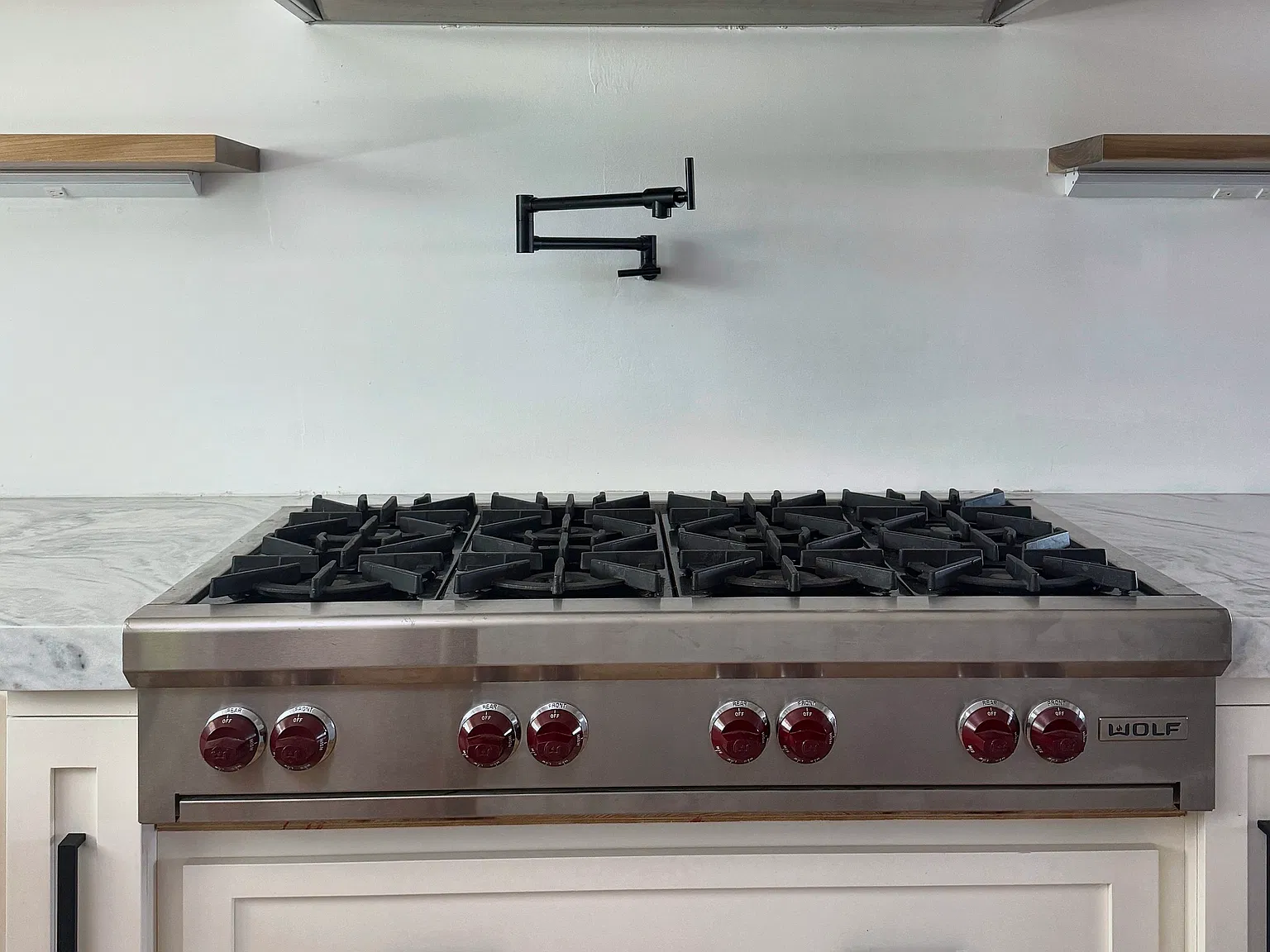 8-burner easy-clean Wolf range with a pot filler on filtered water.