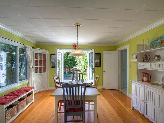 Dining Room with French Doors opening to Courtyard