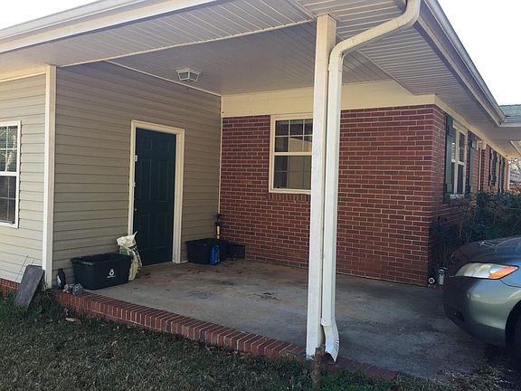 Carport. The door opens into the mudroom.