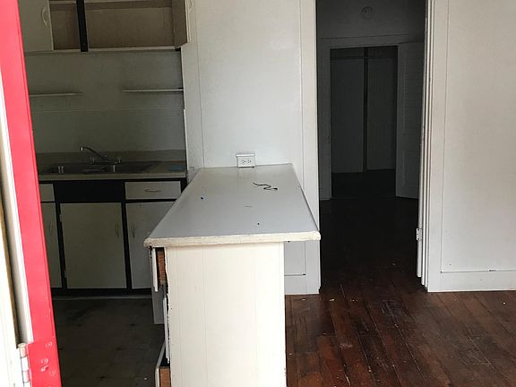 Walk into the dining room, kitchen is to the left. The door straight leads to the bedroom and walk in hand made custom closet.