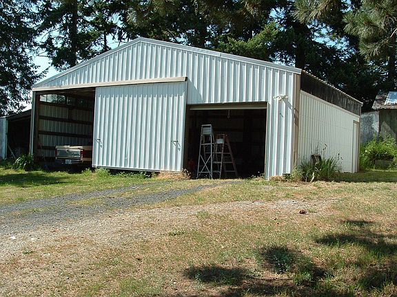 3 Car Garage with Roll up & Slider Doors
