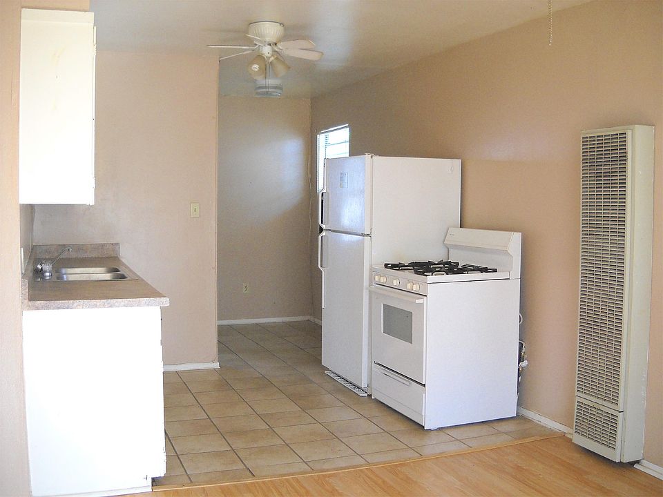 Convenient kitchen is located off the living room. Brand new counter top.