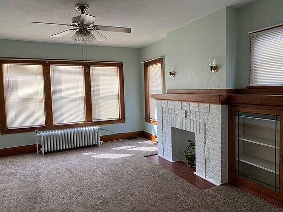 living room with plenty of lighting