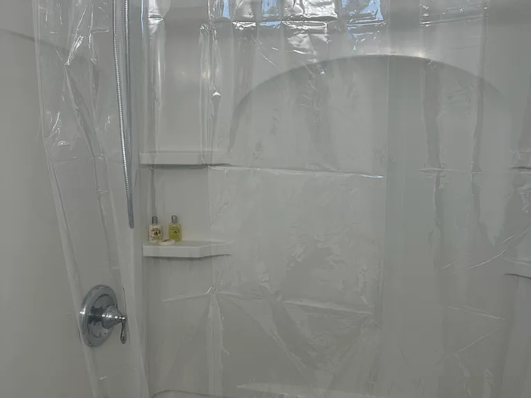 soaking tub with hand held shower head
