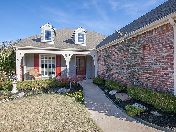 Covered porch, professional landscape