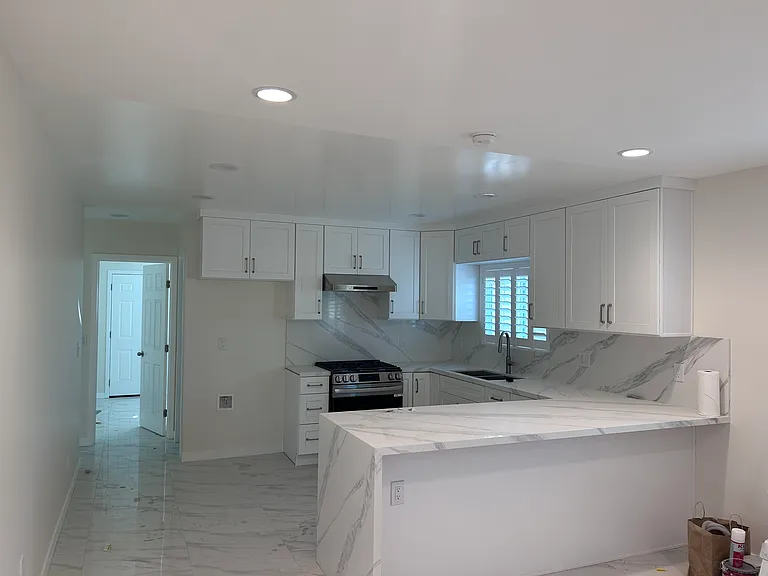 Kitchen (newly renovated, new cabinets and new stove)