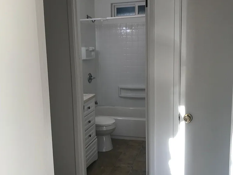 Bathroom & closet in hallway.