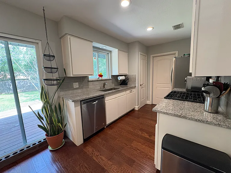 Galley style kitchen with lots of natural light!