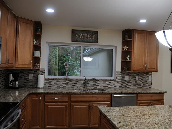 Brand new kitchen with granite countertop and new appliances