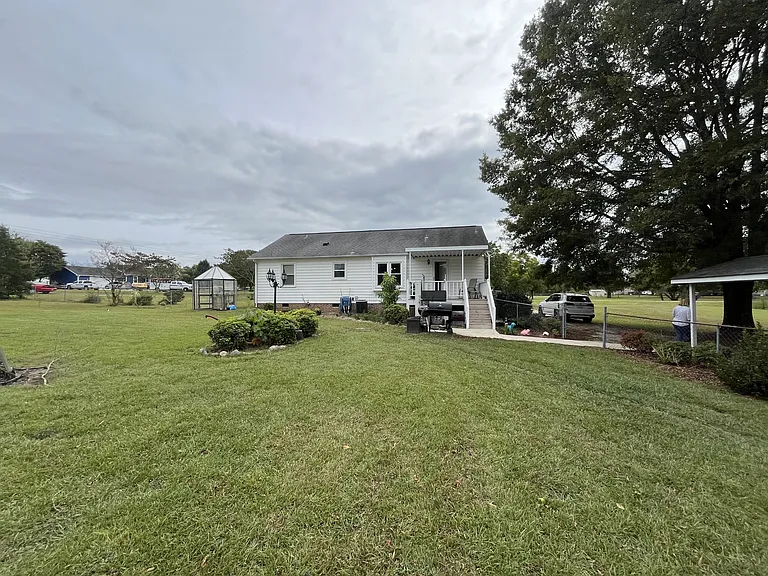 Large Backyard with Covered Deck Perfect for Relaxing Outdoors!