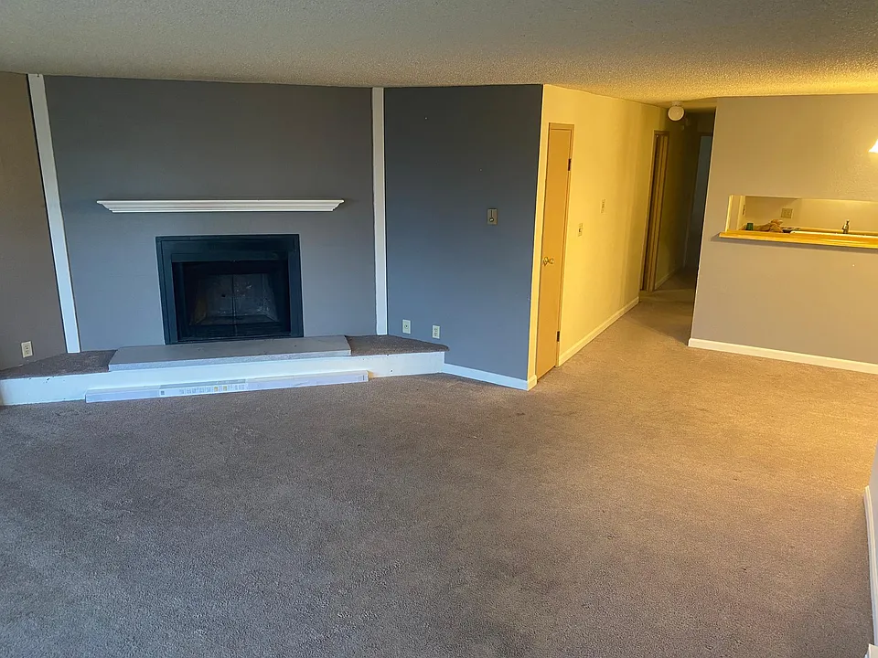 Beautiful, statement fireplace & hearth