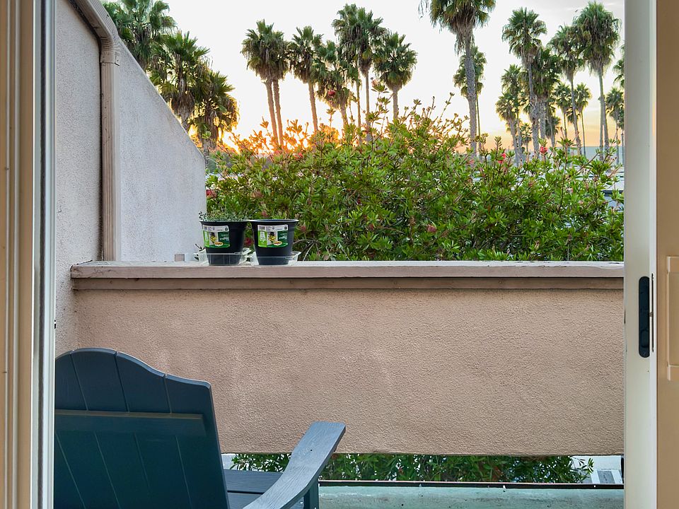 Facing west, enjoy beautiful treetop and distant sunset views.