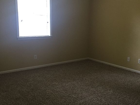 Master Bedroom with New Carpet and In-Suite Bath